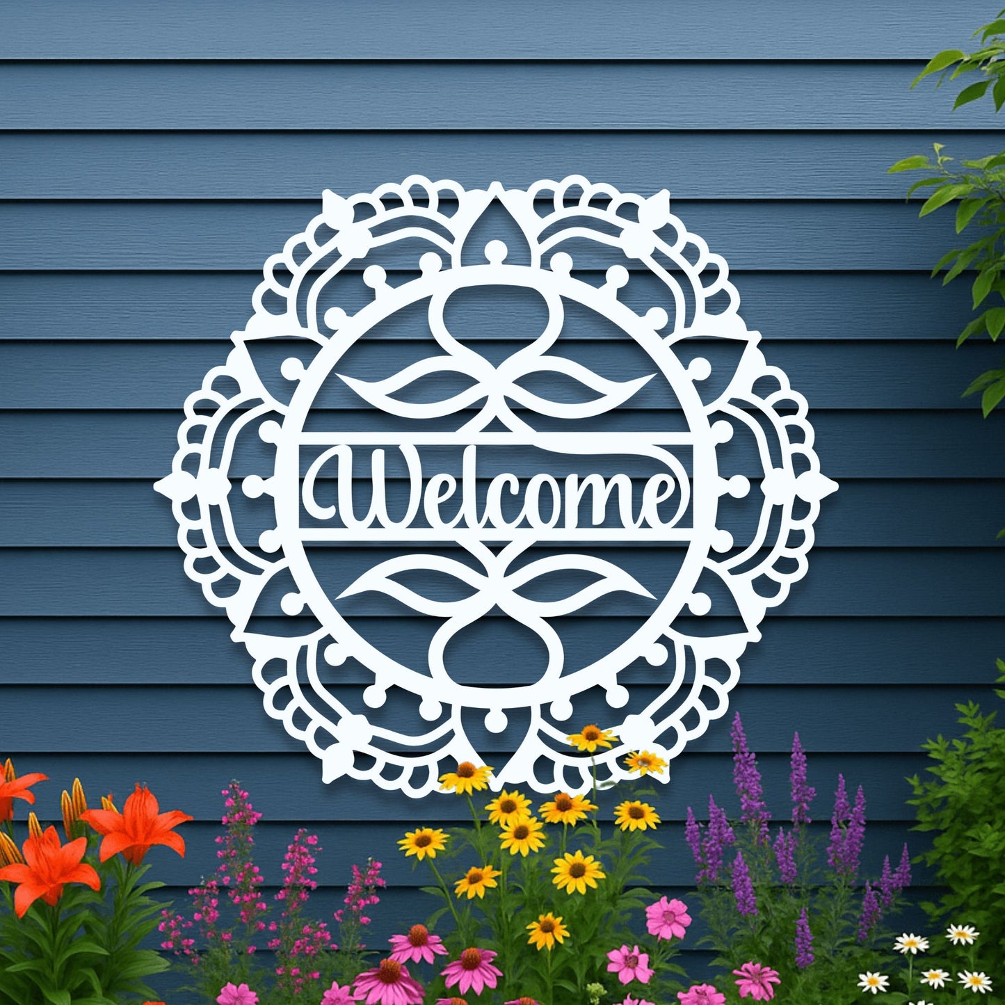 Decorative 'Welcome' sign on a blue wall with flowers in the foreground