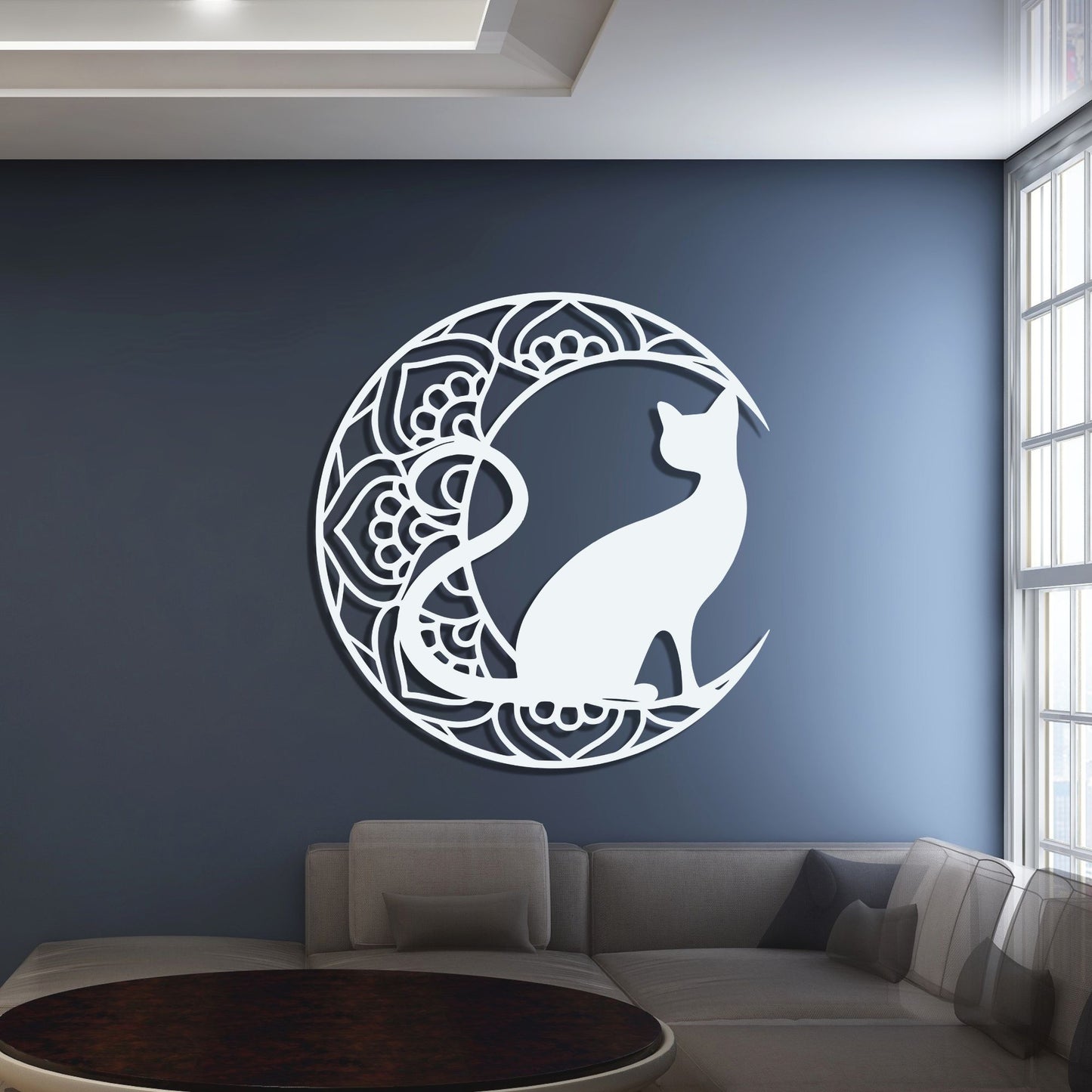 Decorative wall sticker of a cat and swan design on a blue wall in a living room.