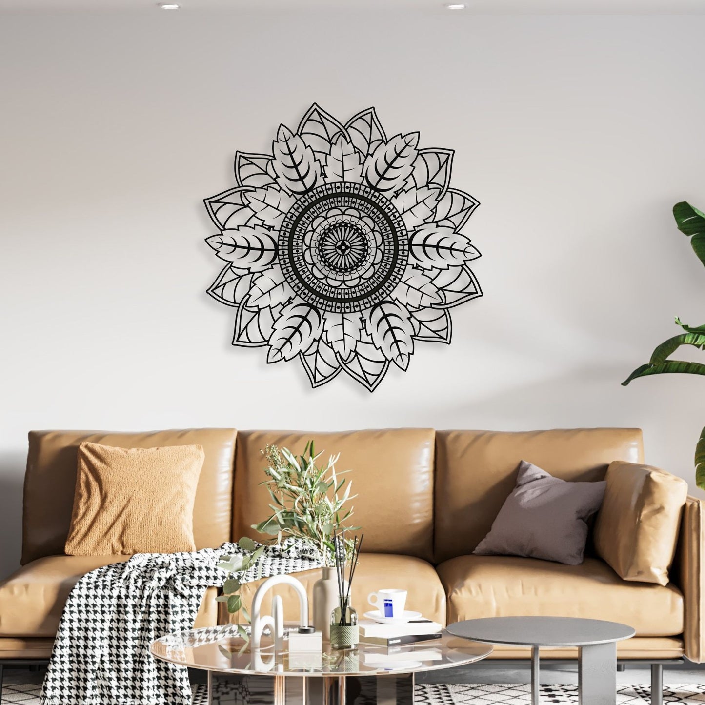 Decorative wall art above a brown sofa in a living room setting