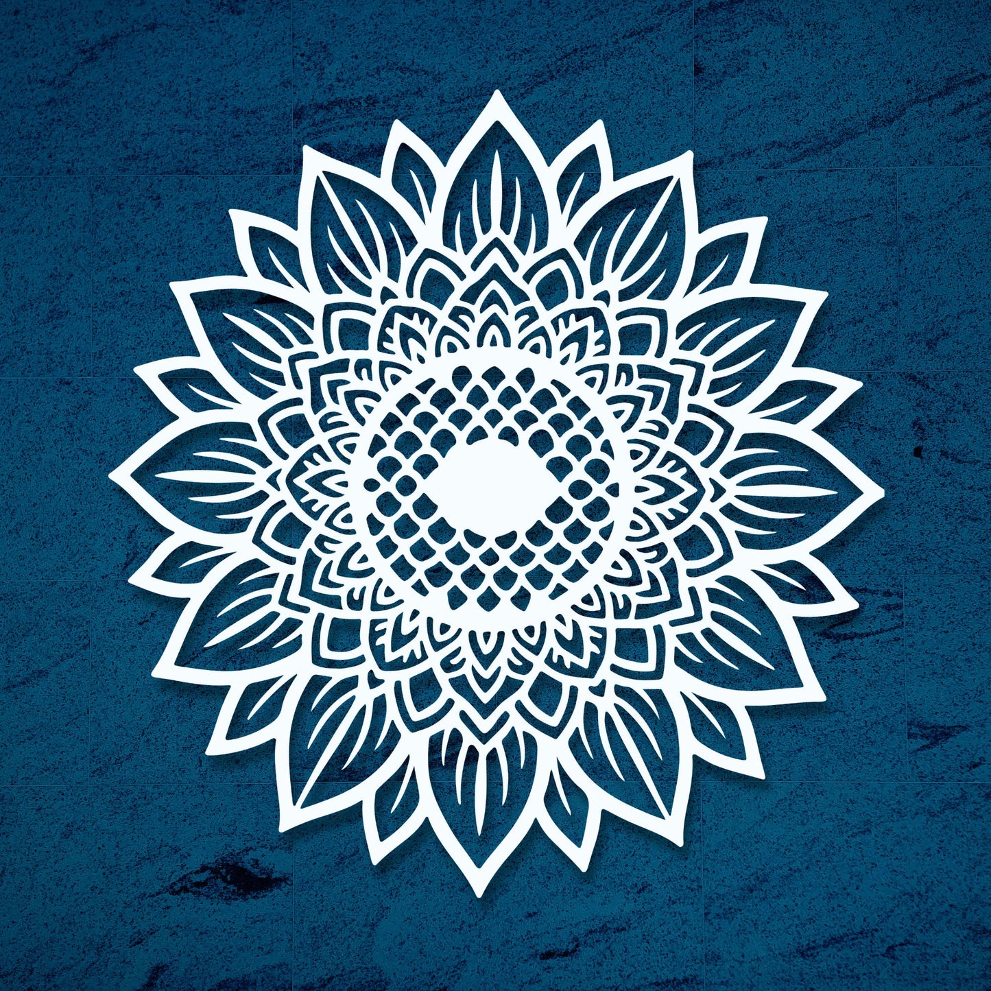 White floral mandala design on a blue textured background