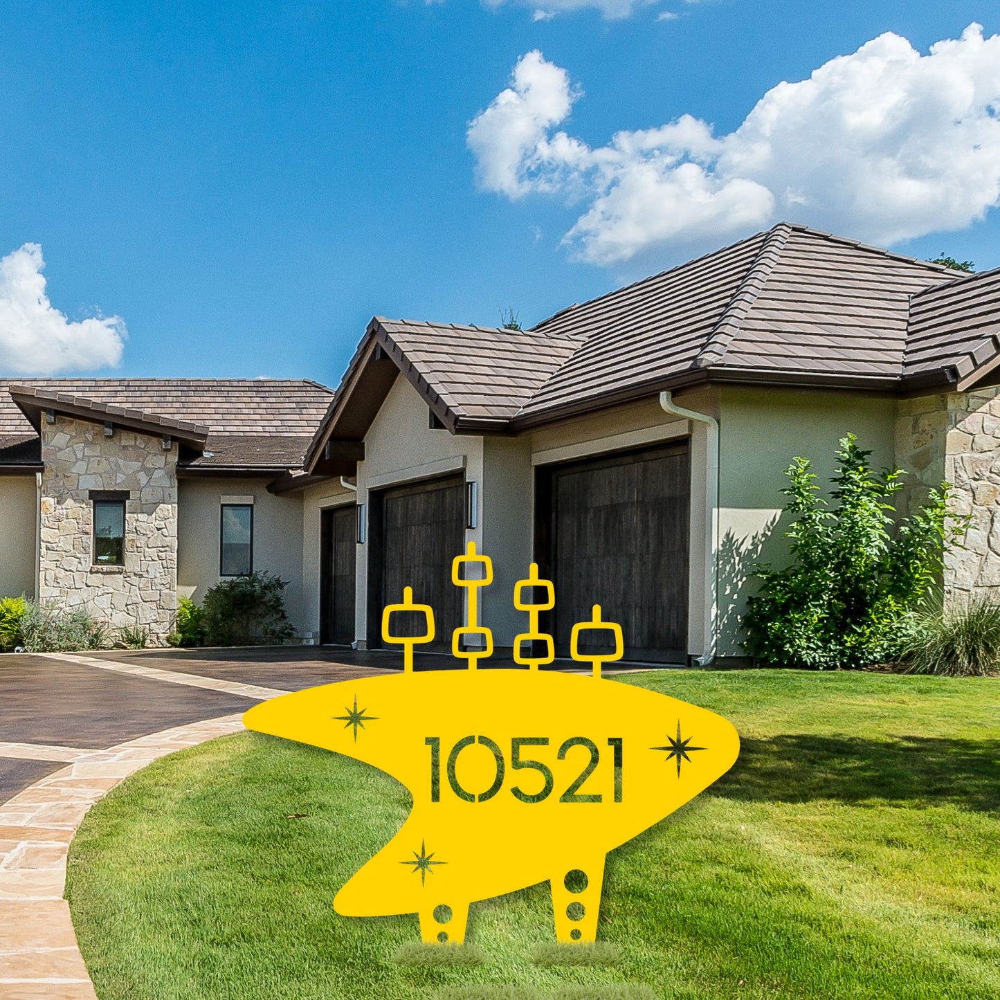 Yellow mailbox with '10521' address in front of a house