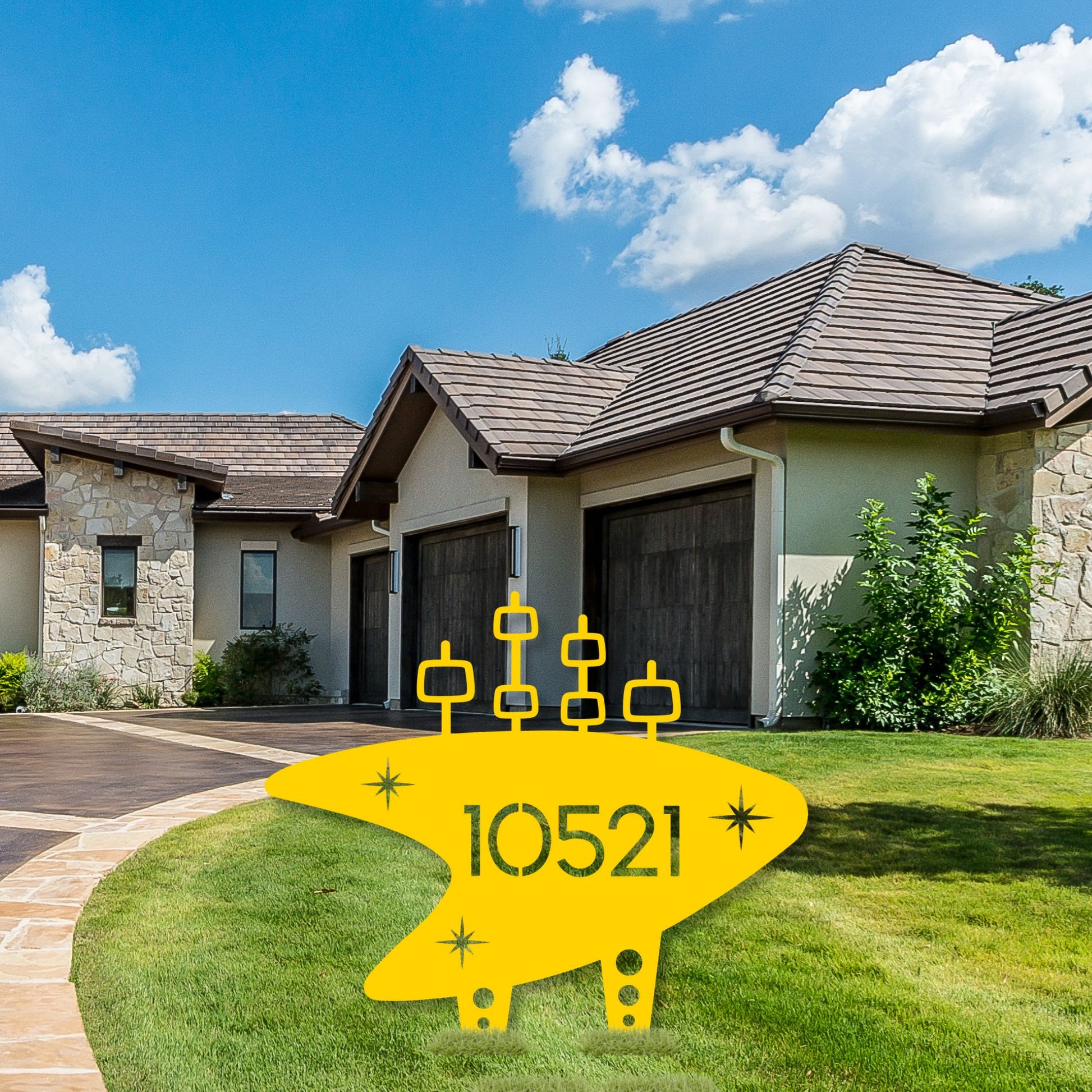 Yellow mailbox with '10521' address in front of a house