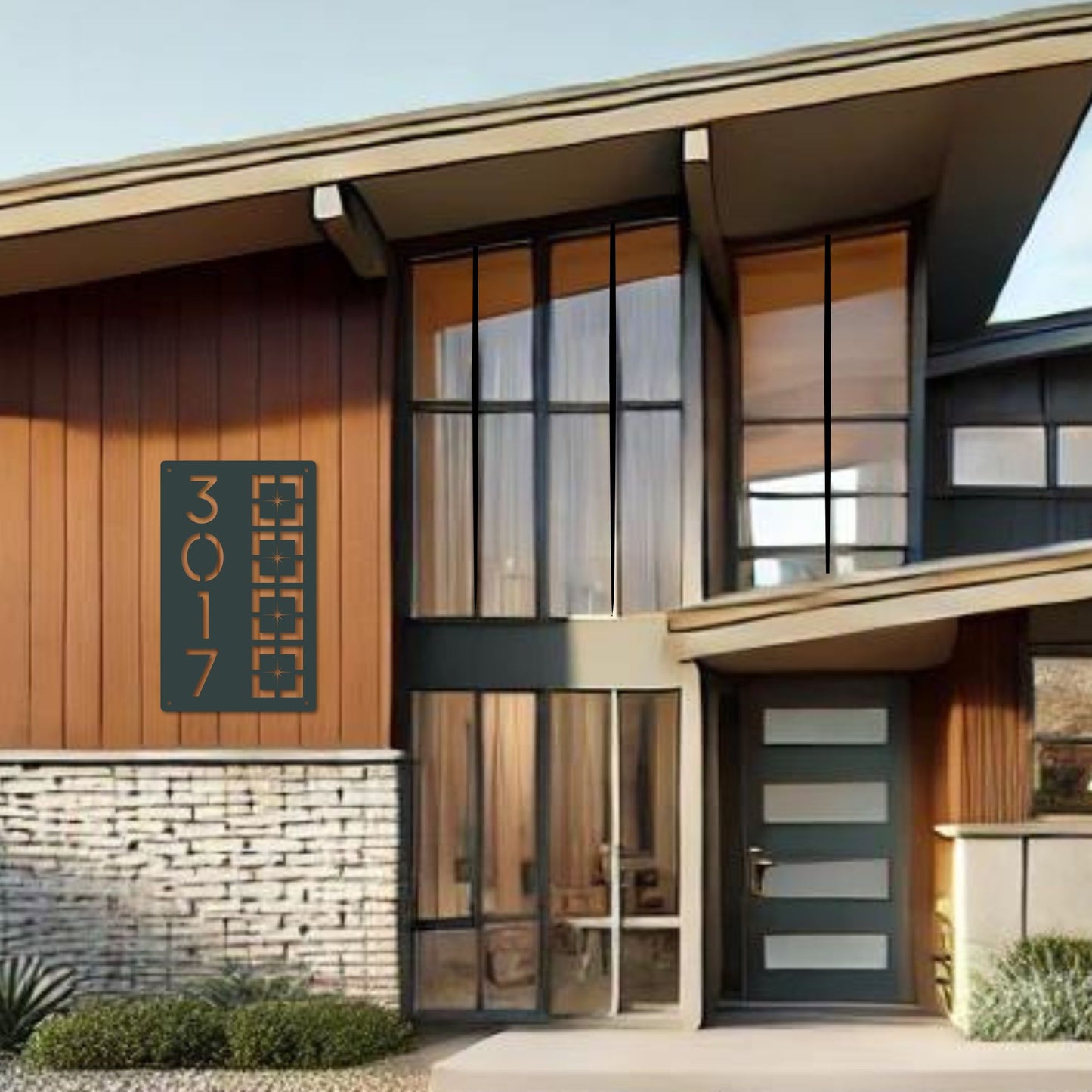 Metal Address Sign, Vertical Starburst Block shown in charcoal on front of home exterior