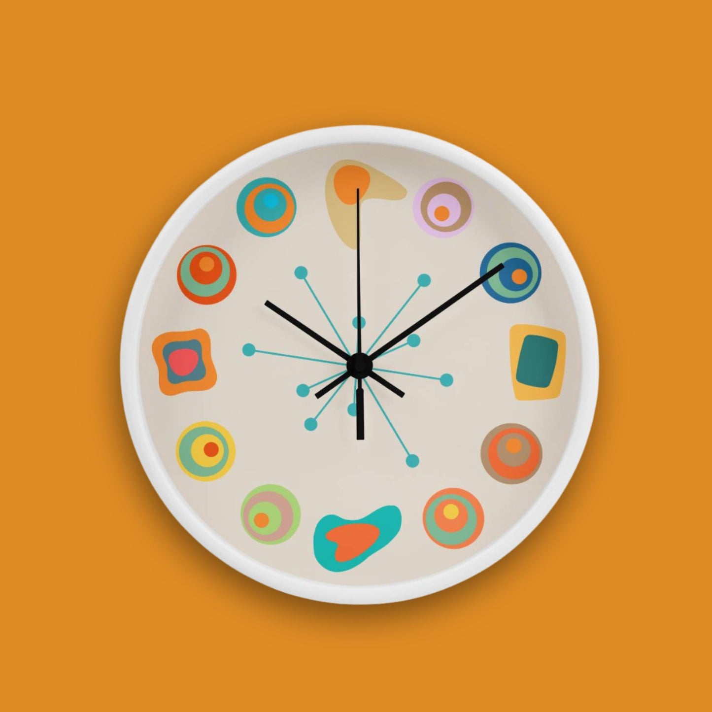 Round clock with colorful abstract design on an orange background
