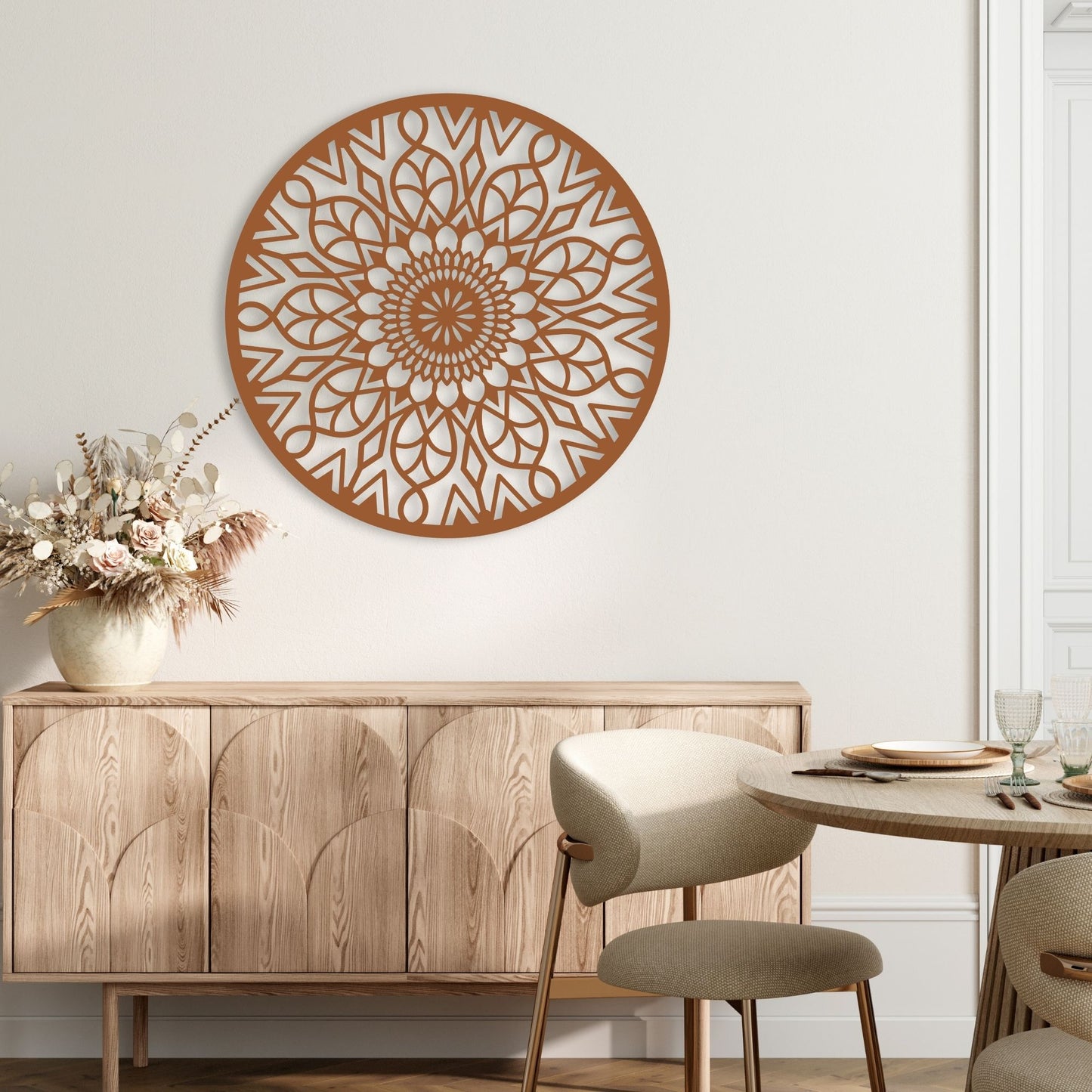 Decorative wall art with floral arrangement and wooden furniture in a room.