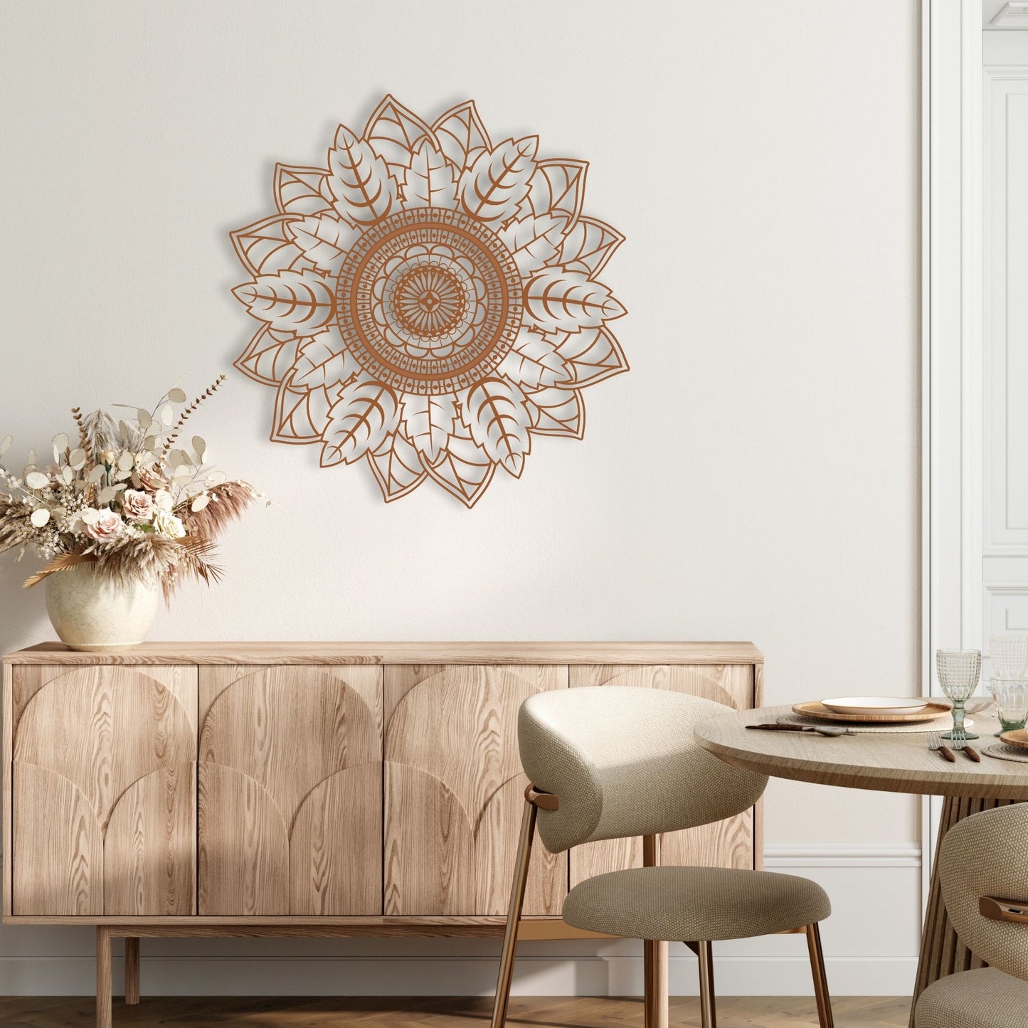 Decorative mandala wall art above a wooden cabinet in a dining room.