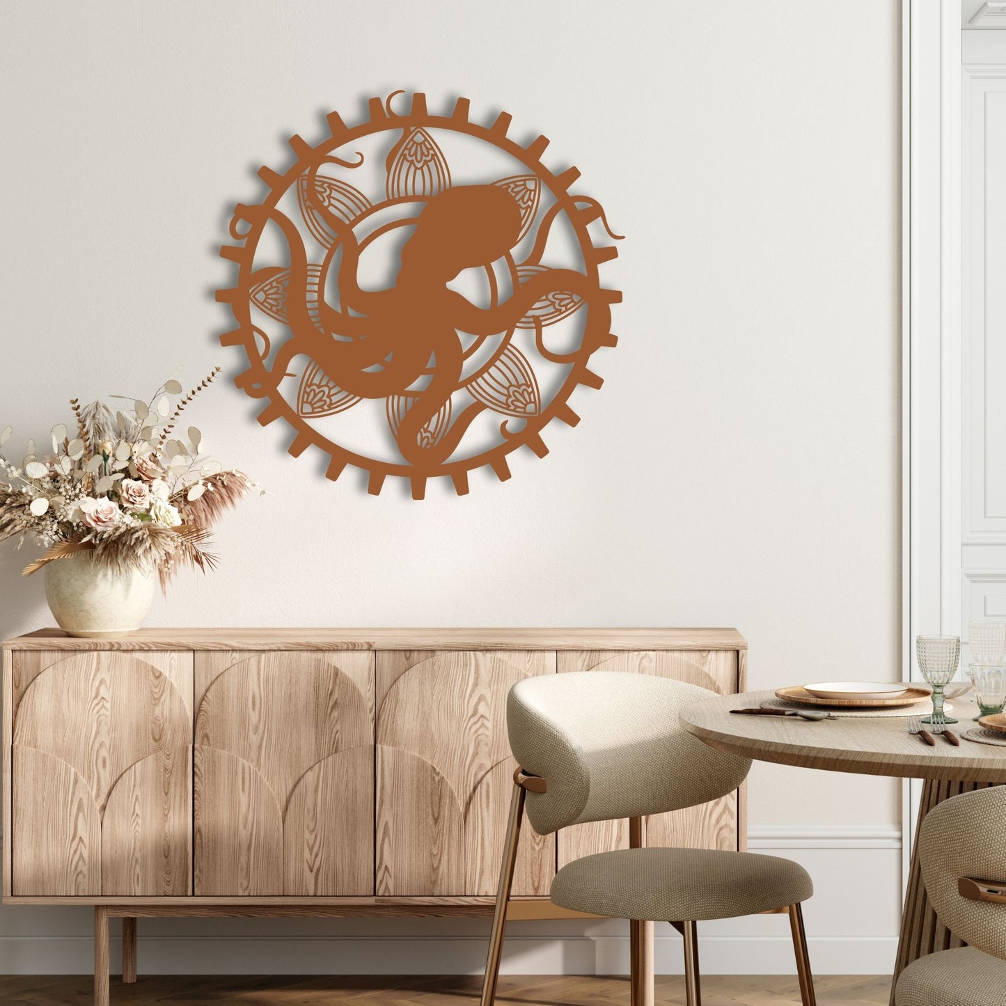 Decorative wall art with a fish design on a white wall above a wooden cabinet.