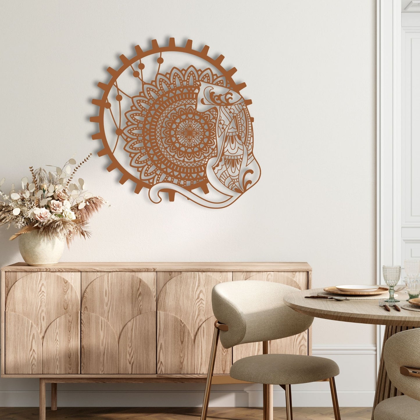 Decorative wall art above a wooden cabinet in a dining room setting.