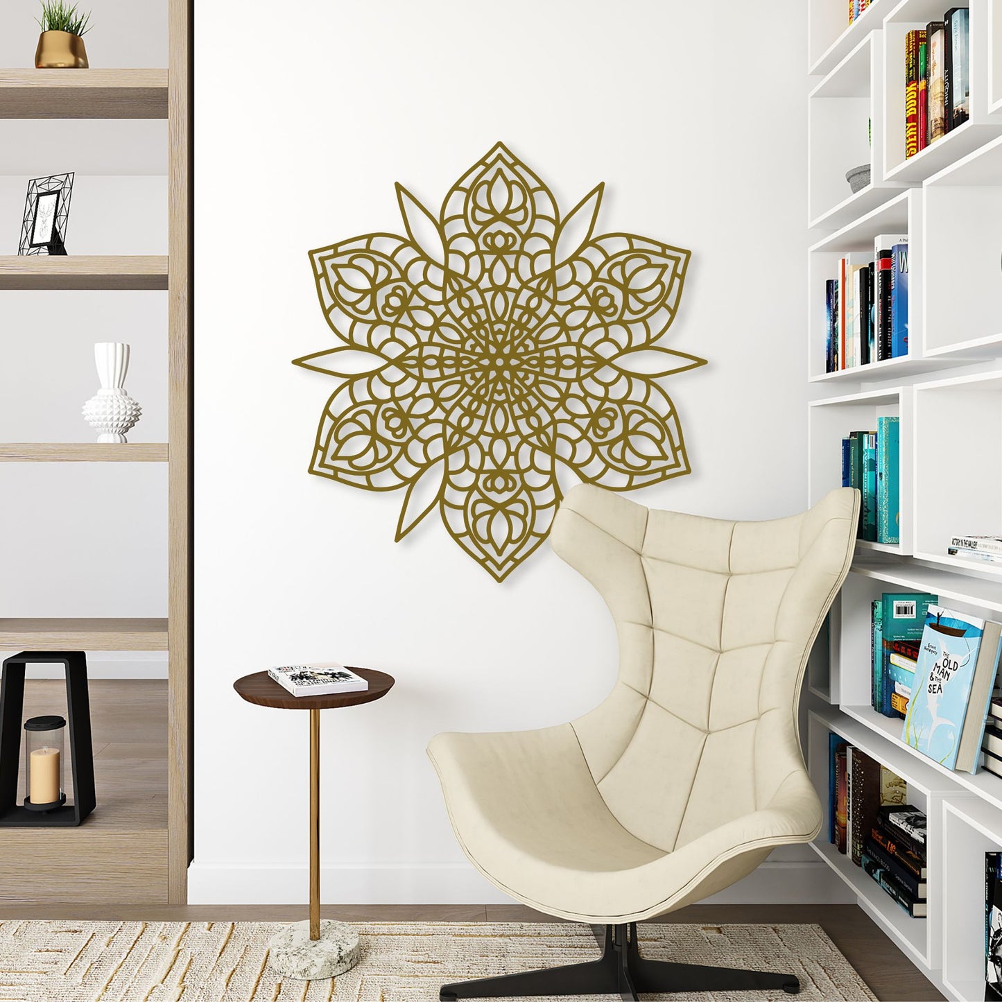 Decorative wall art in a room with a chair and bookshelves.