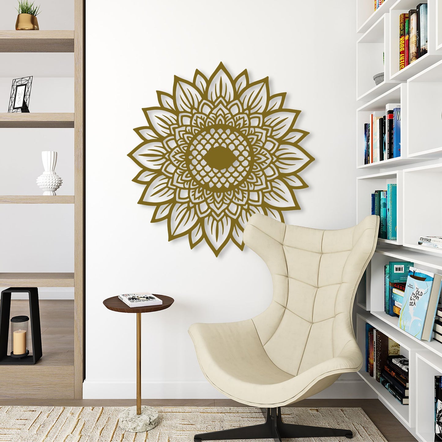 Decorative wall art in the shape of a mandala on a white wall above a beige armchair.
