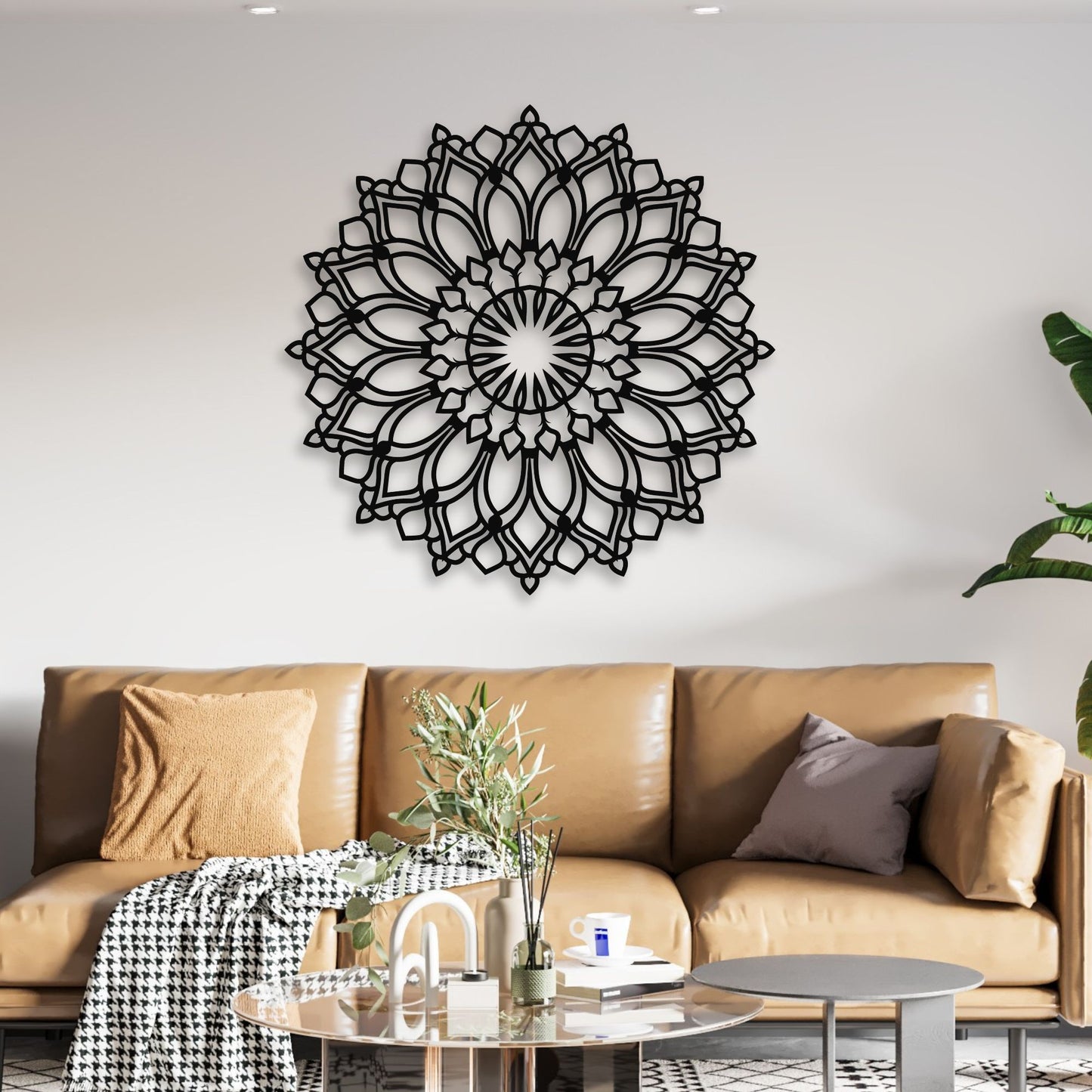 Lotus Flower Mandala Metal Wall Art black hanging over modern living room leather couch