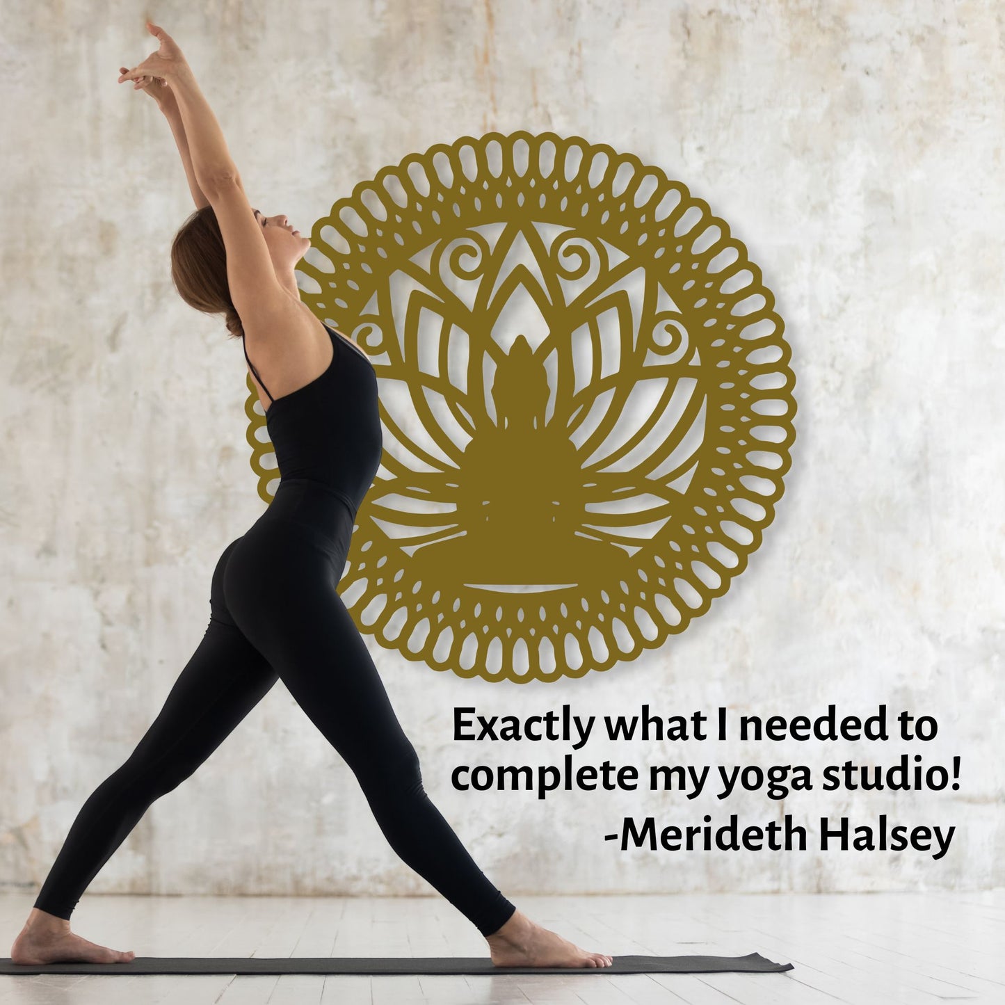 Woman in yoga pose with a decorative wall art piece in the background