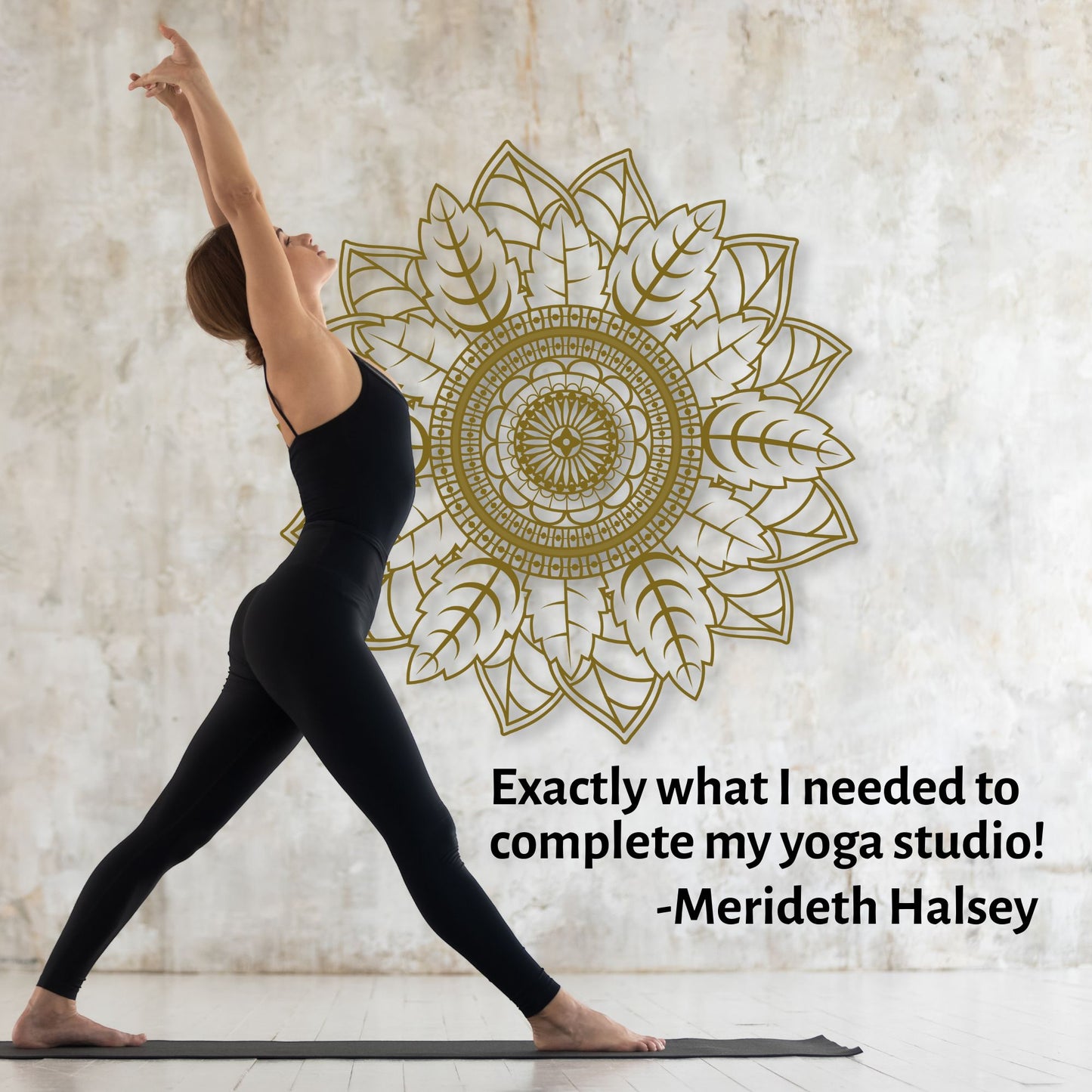 Woman in black yoga attire performing a pose with a decorative mandala wall art and quote from Merideth Halsey.