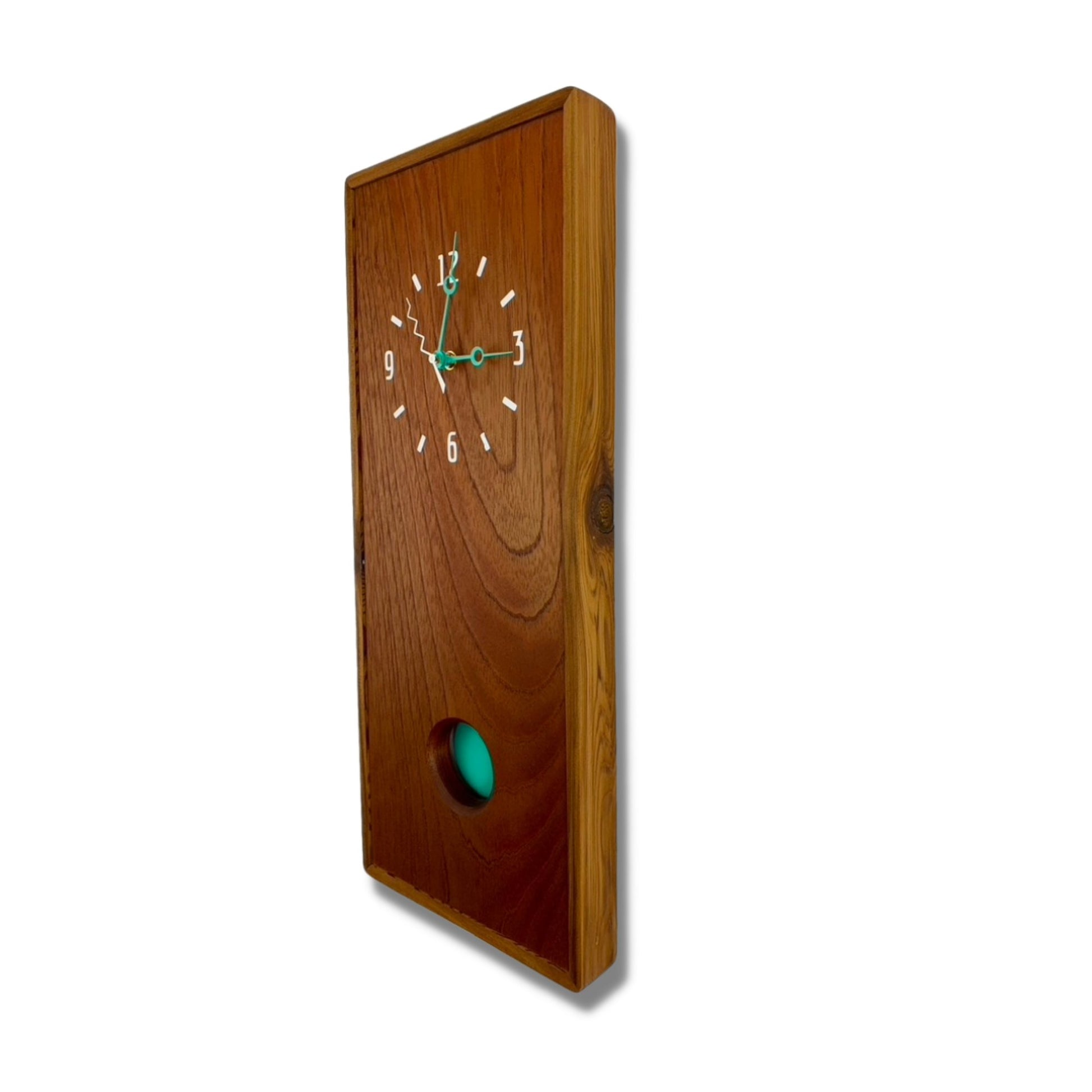 KingWood Pendulum Wall Clock In Cedar & Turquoise on right