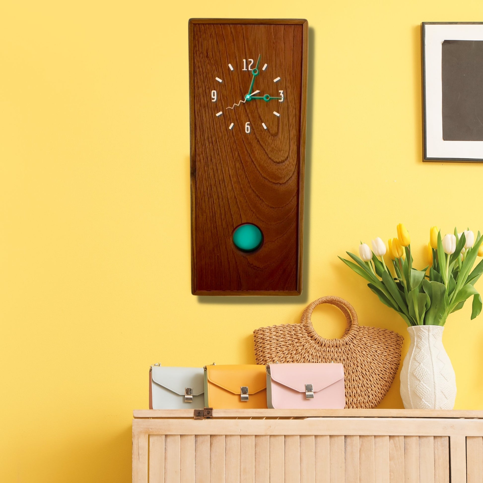 KingWood Pendulum Wall Clock In Cedar & Turquoise on yellow living room wall