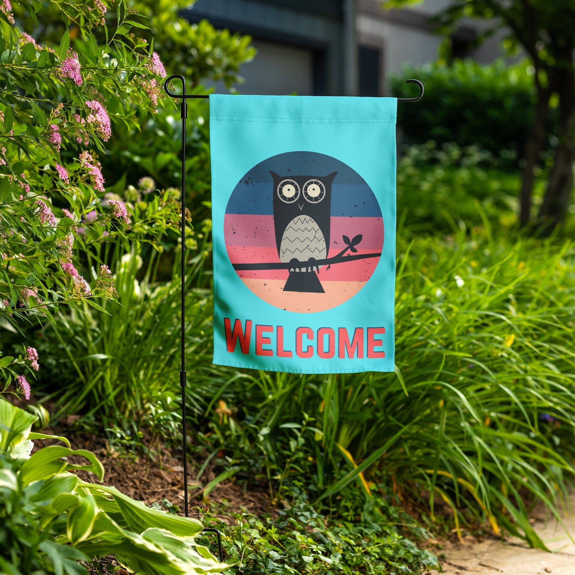 Sunset Owl Welcome Garden Banner in Blue in yard