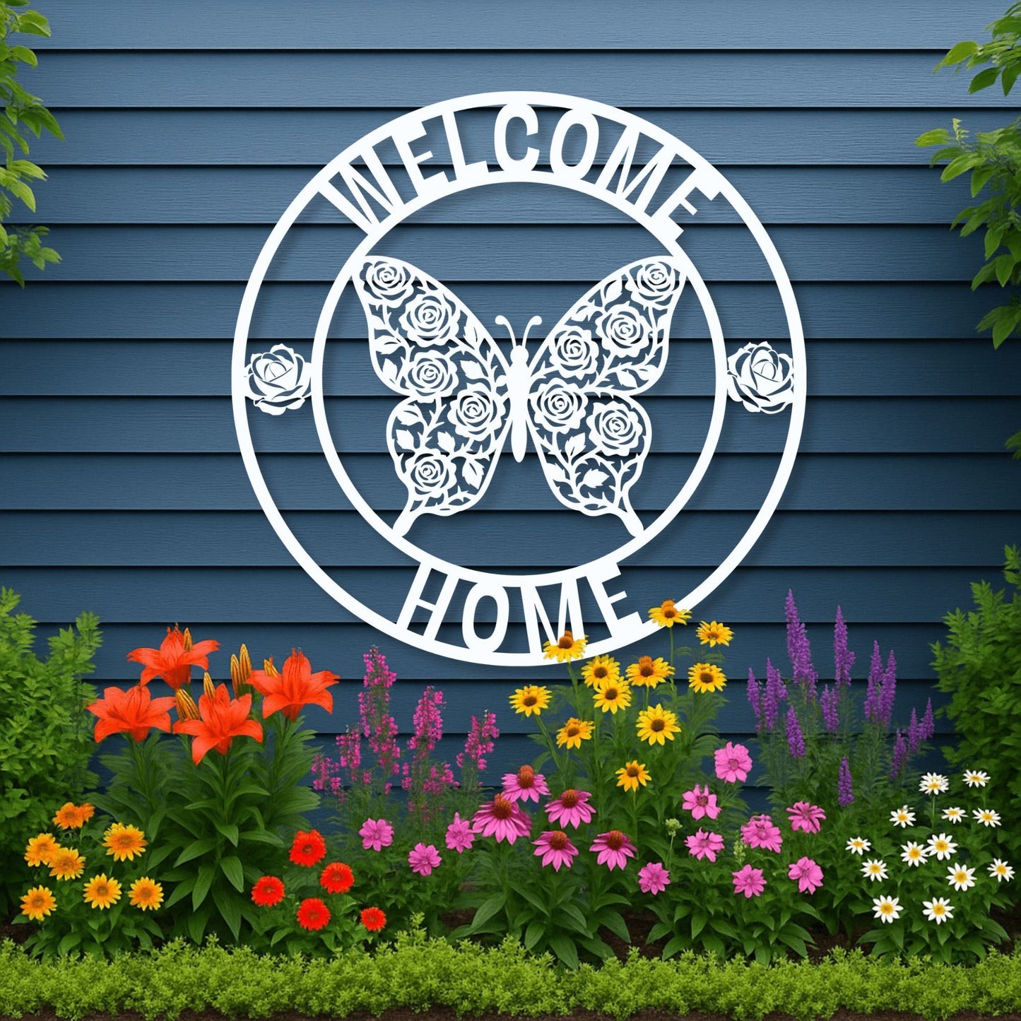 Decorative metal sign with butterfly and floral design on a blue wall with garden flowers below.