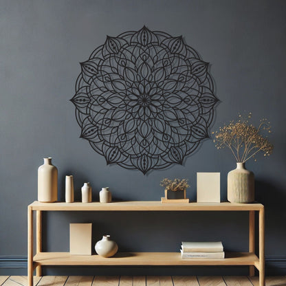 Decorative black mandala wall art on a dark gray wall with a wooden console table and decorative items.