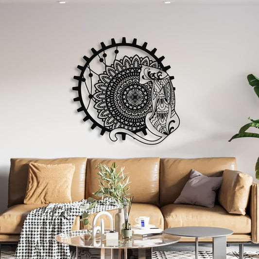 Decorative wall art with mandala design above a brown sofa in a living room.