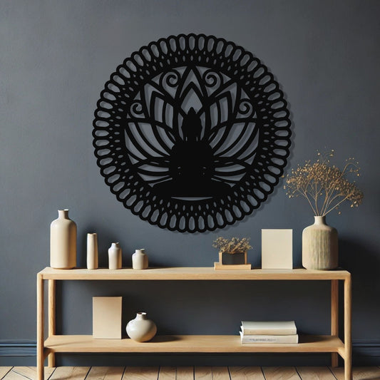 Decorative wall art with a black lotus design on a gray wall above a wooden console table.