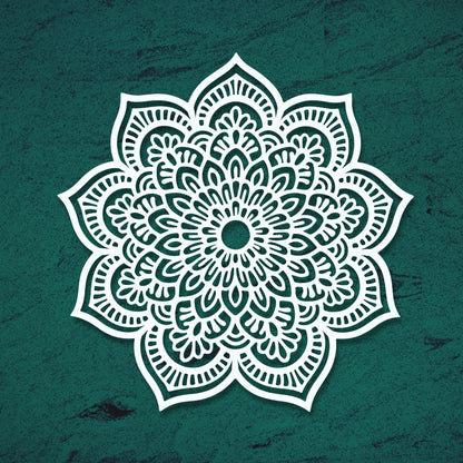 White mandala design on a teal textured background