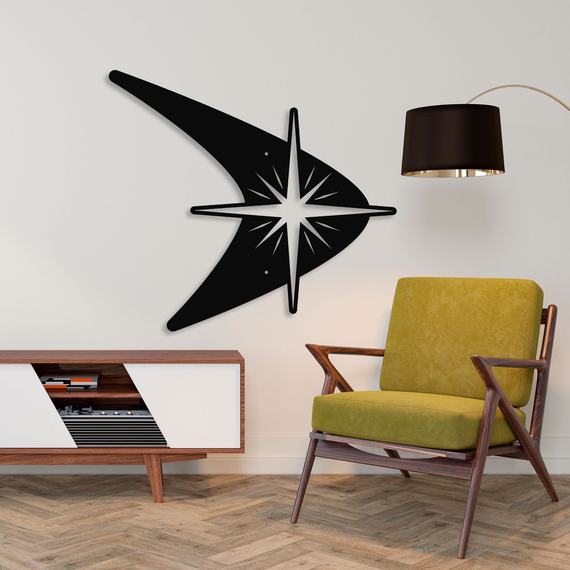 Modern interior with a green chair, wooden cabinet, and decorative wall clock.
