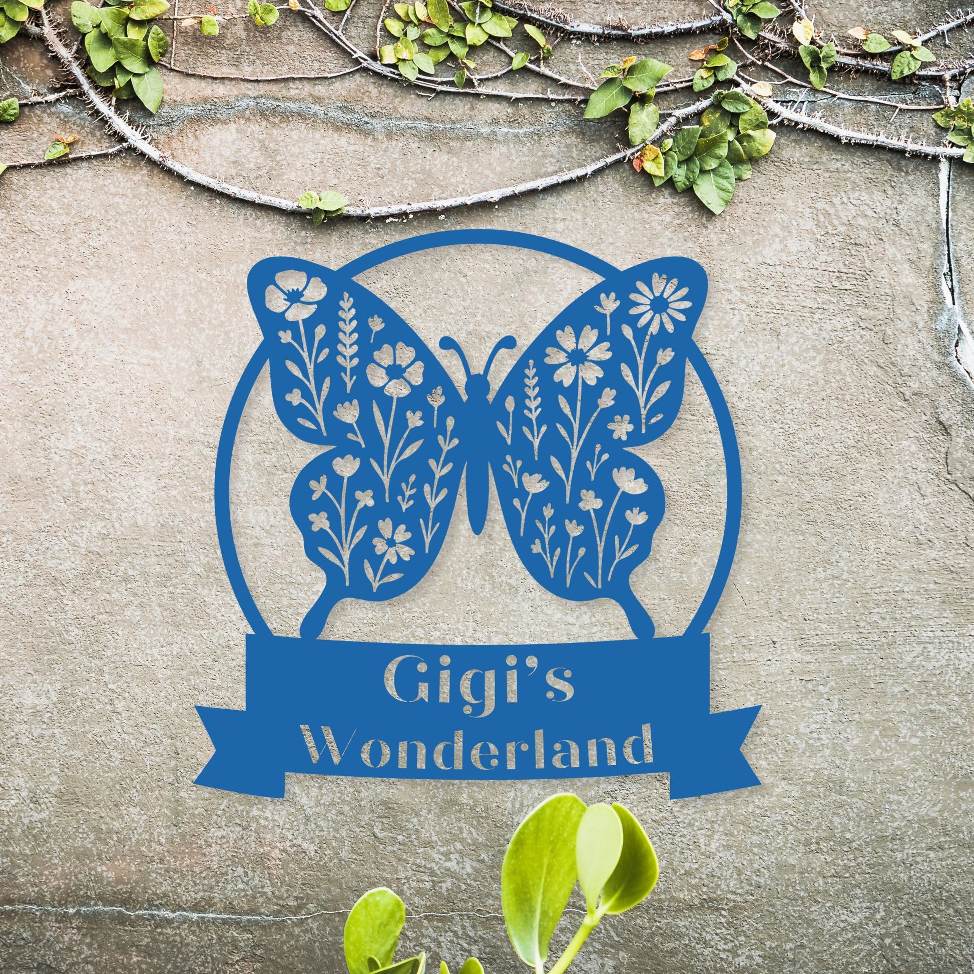 Blue butterfly design with 'Gigi's Wonderland' text on a stone background