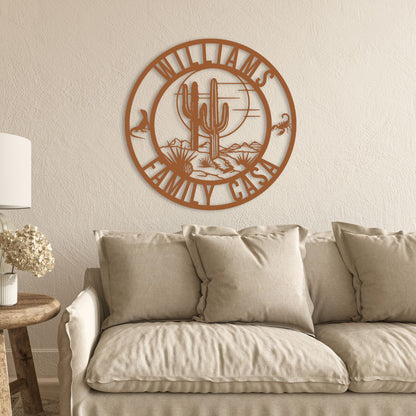 Decorative wall art with 'Williams Family Casa' on a beige wall above a beige sofa.