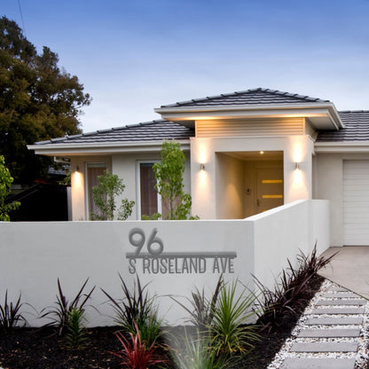 Modern house with '96 S Roseland Ave' address sign in a well-maintained garden.