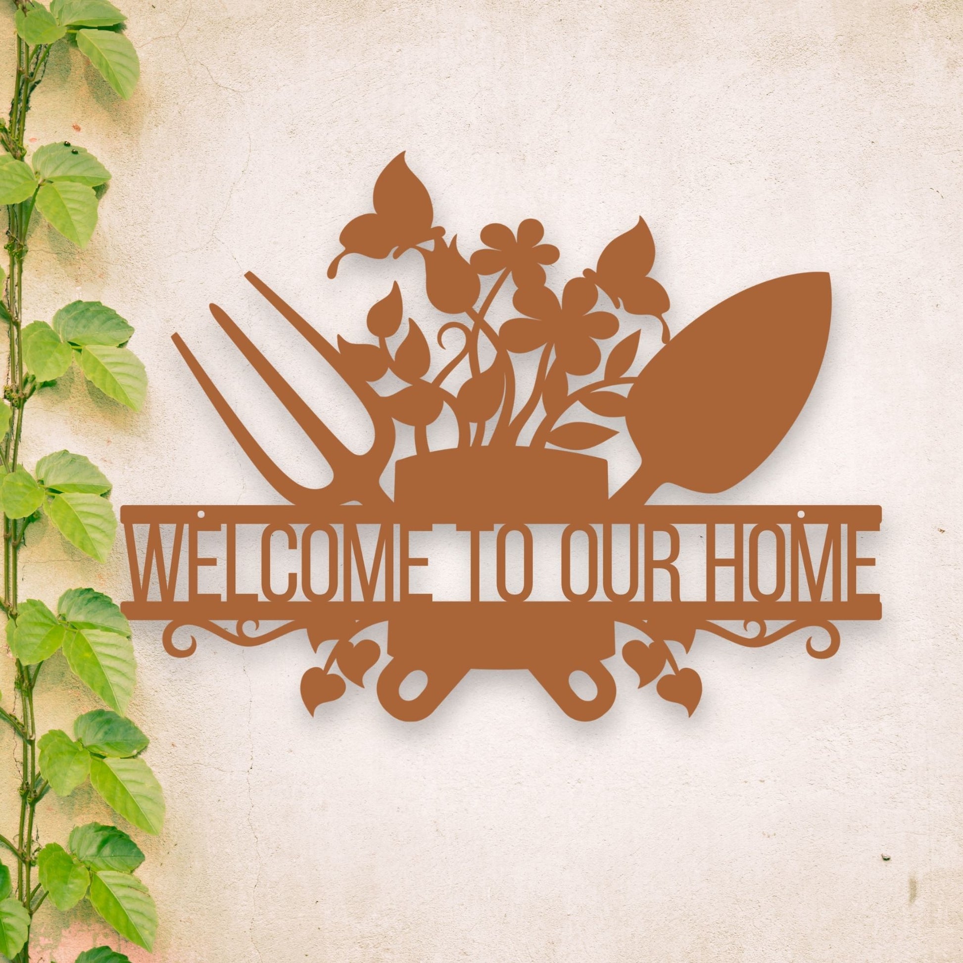 Decorative metal sign with garden-themed design and 'Welcome to our home' text on a textured background.