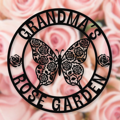 Decorative metal sign with butterfly and 'Grandma's Rose Garden' text on a background of pink roses.