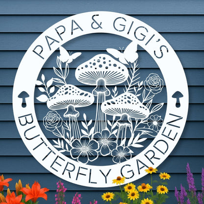 Decorative garden sign with 'Papa & Gigis Butterfly Garden' on a blue wall with flowers and plants.