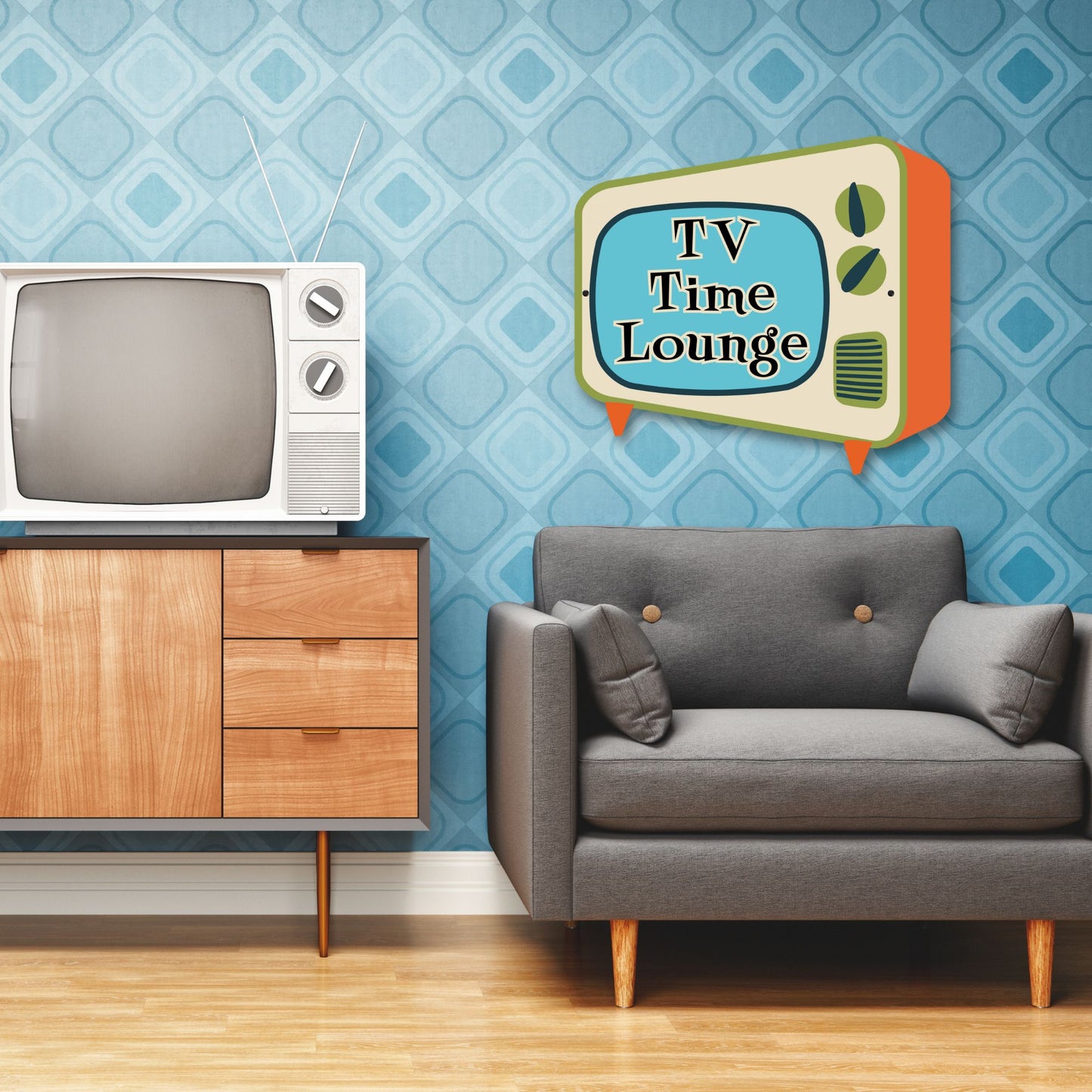 Living room with vintage-style TV, gray sofa, and decorative wall art.