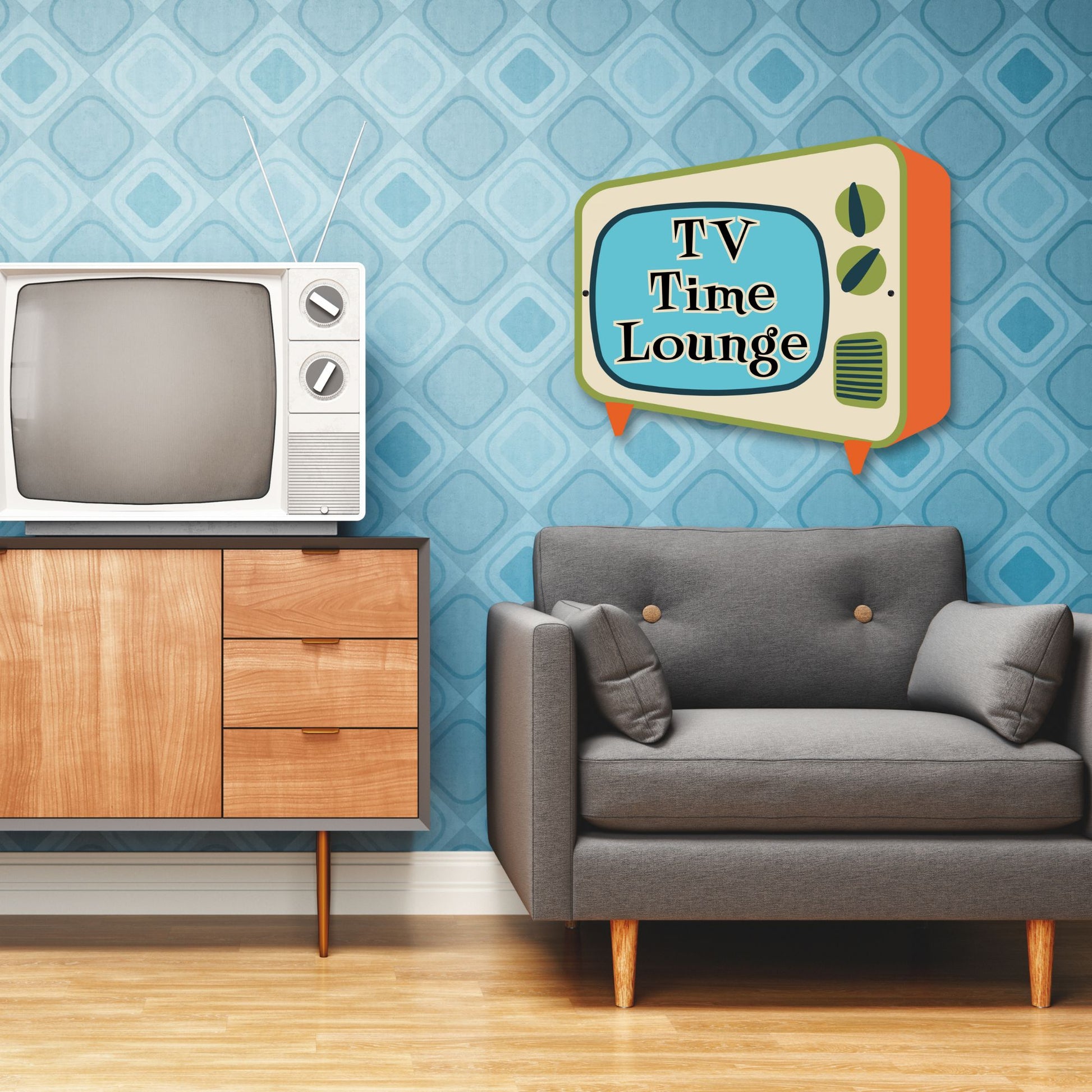 Living room with vintage-style TV, gray sofa, and decorative wall art.