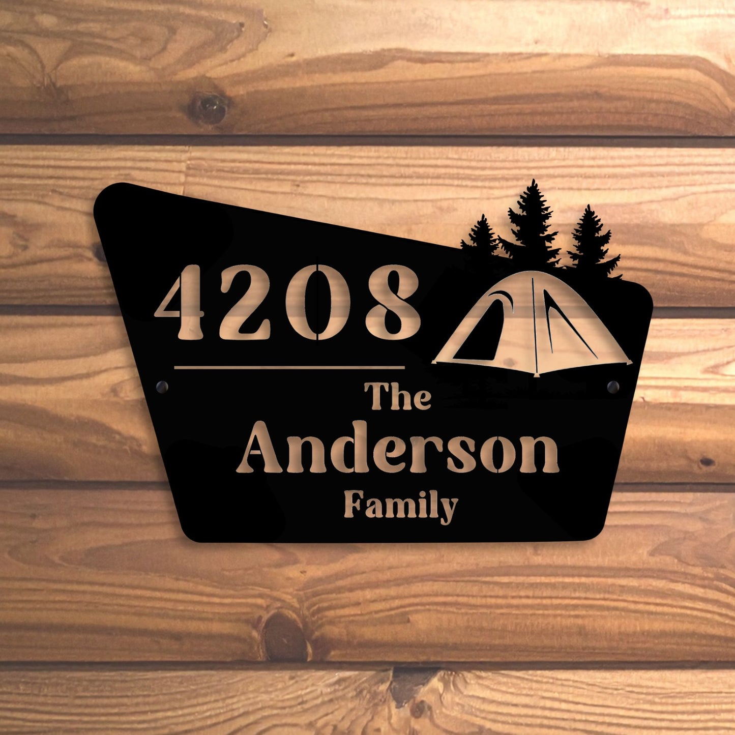 Personalized house number sign with camping design and text on a wooden background