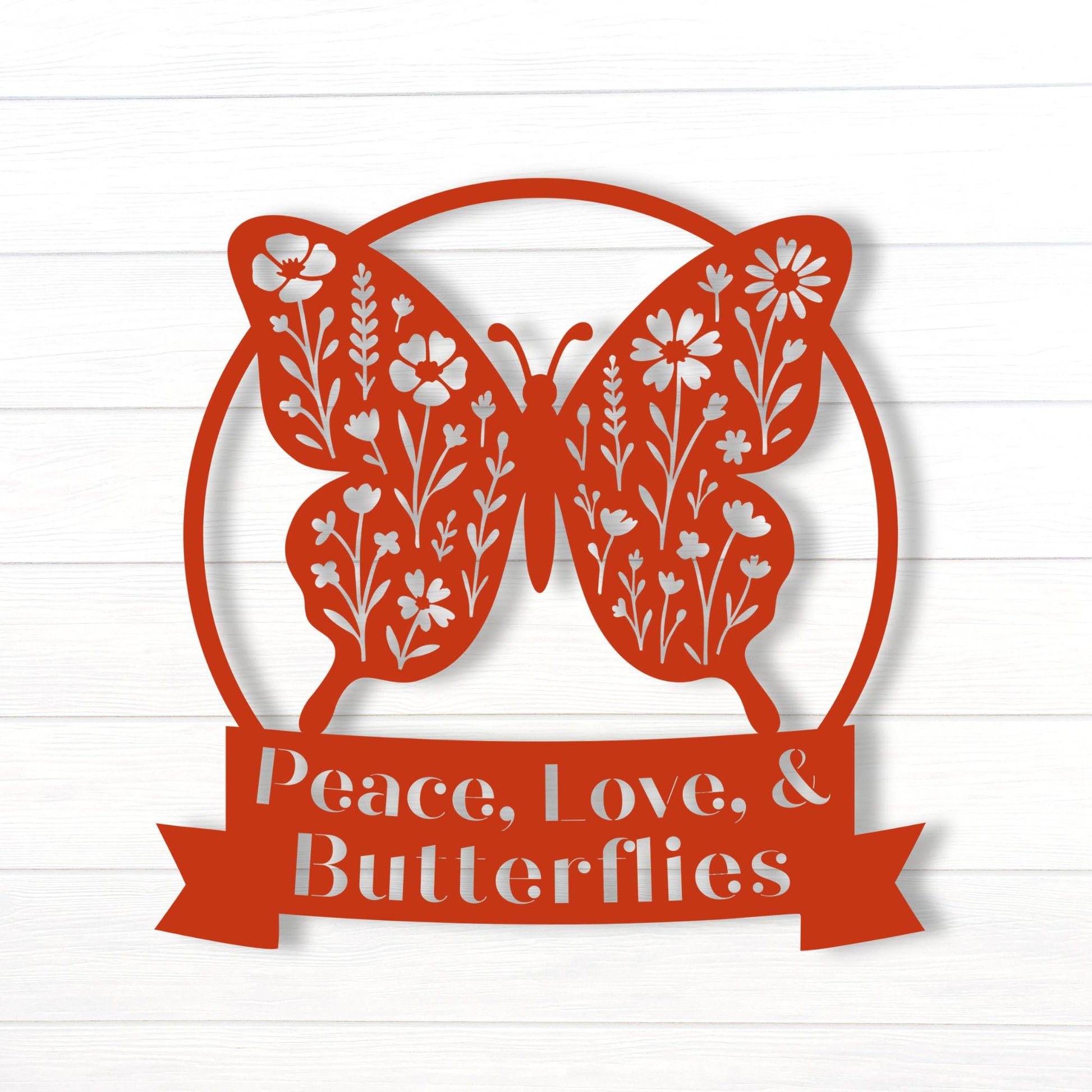 Decorative metal sign with butterfly design and 'Peace, Love & Butterflies' text on a white background
