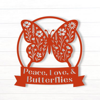 Decorative metal sign with butterfly design and 'Peace, Love & Butterflies' text on a white background