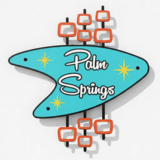 Neon sign with 'Palm Springs' text on a white background