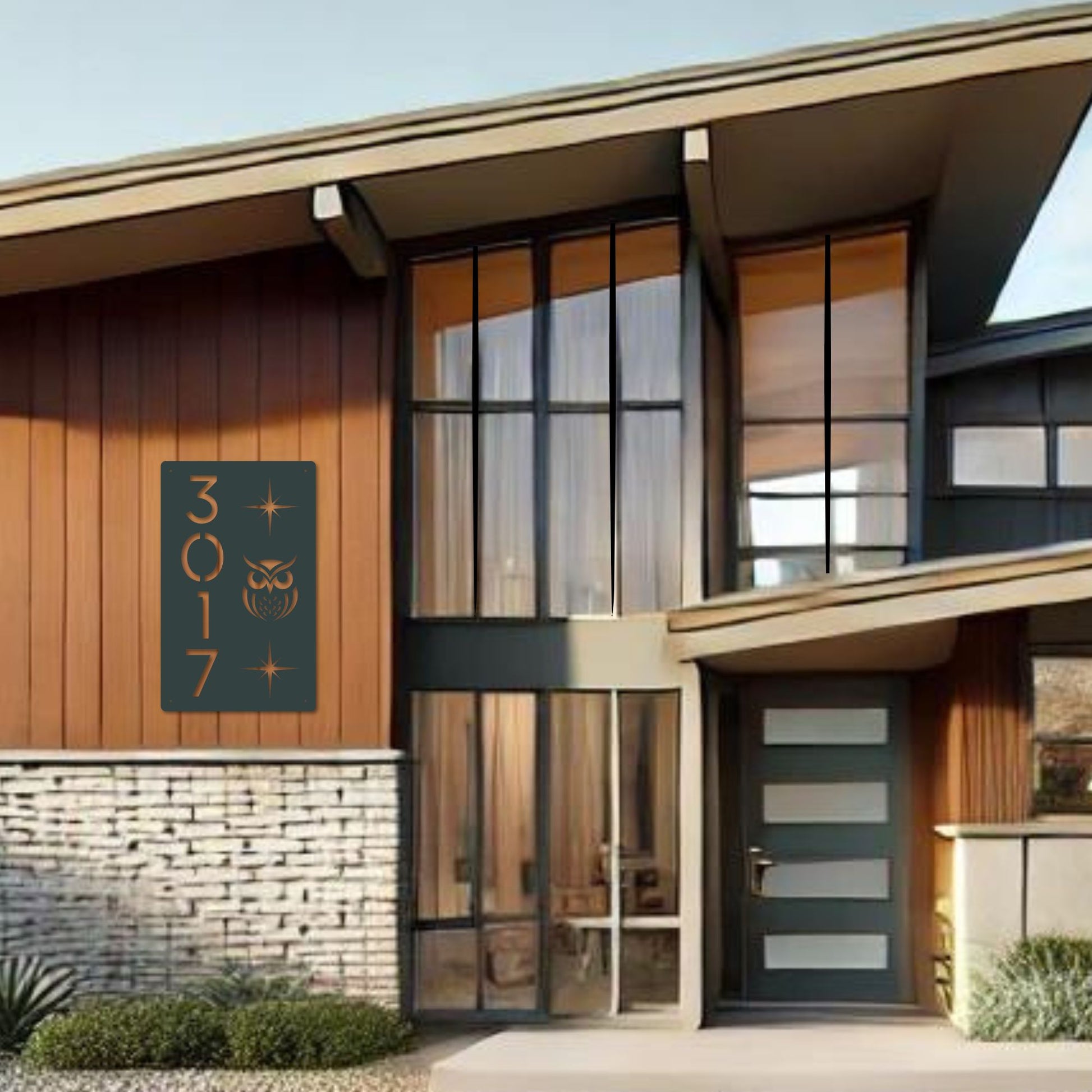 Modern house exterior with a door number sign on a wooden facade