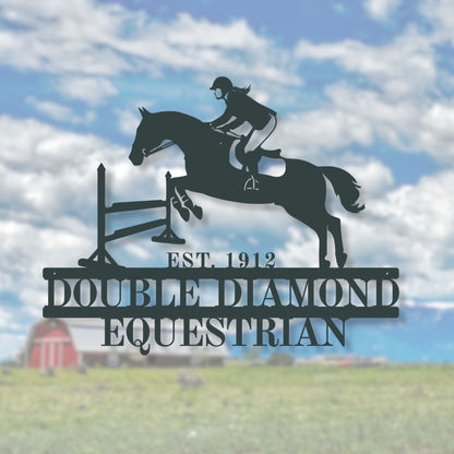 Decorative metal sign of a horse and rider jumping over a fence with 'Double Diamond Equestrian' text against a cloudy sky.