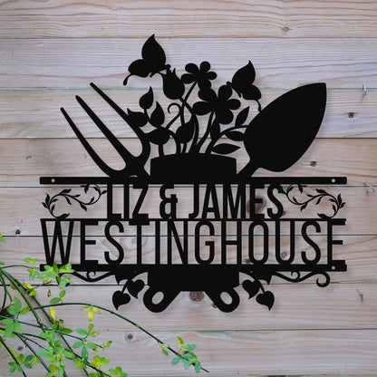 Decorative metal sign with floral design and text on a wooden background