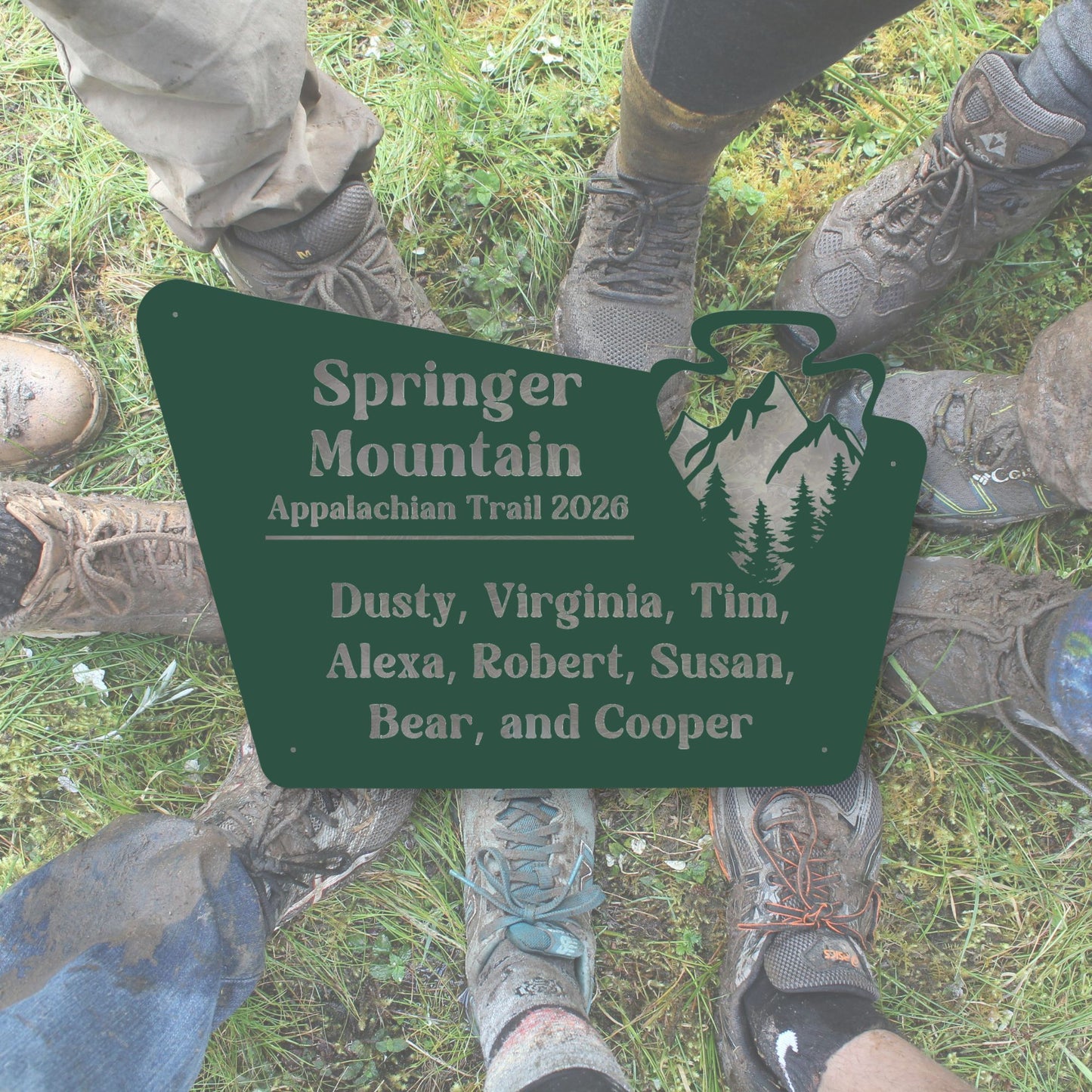 Green sign with names on a grassy background