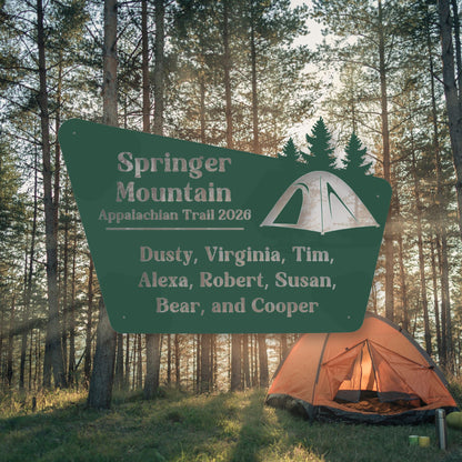 Camping scene with a sign for Springer Mountain Appalachian Trail 2026 and an orange tent in the woods.