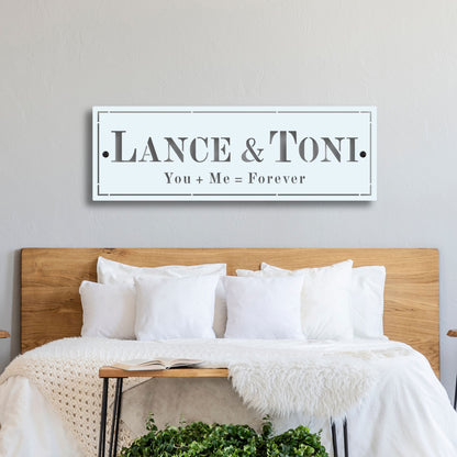 Custom Metal Name Sign, Formal Rectangle Wall Plaque white hanging over the bed in a bedroom