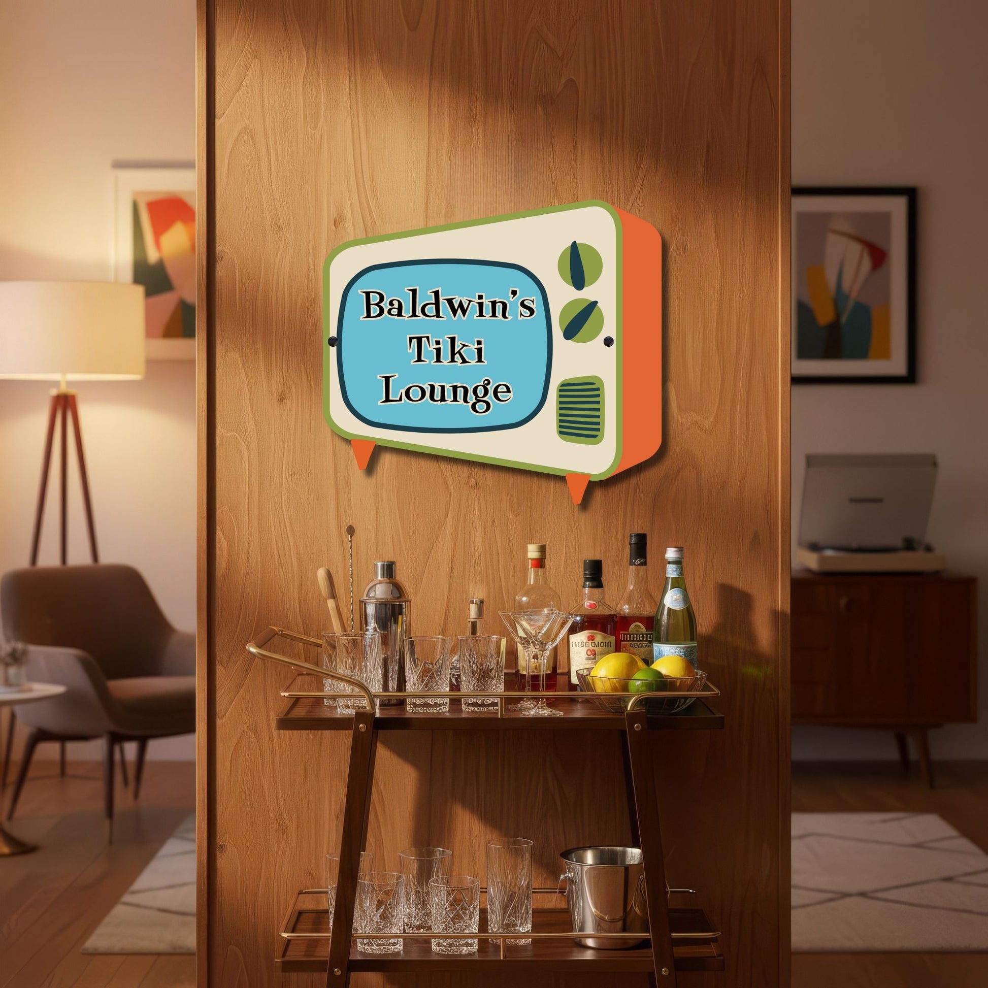 Decorative sign for 'Baldwin's Tiki Lounge' in a room with a bar cart and bottles.