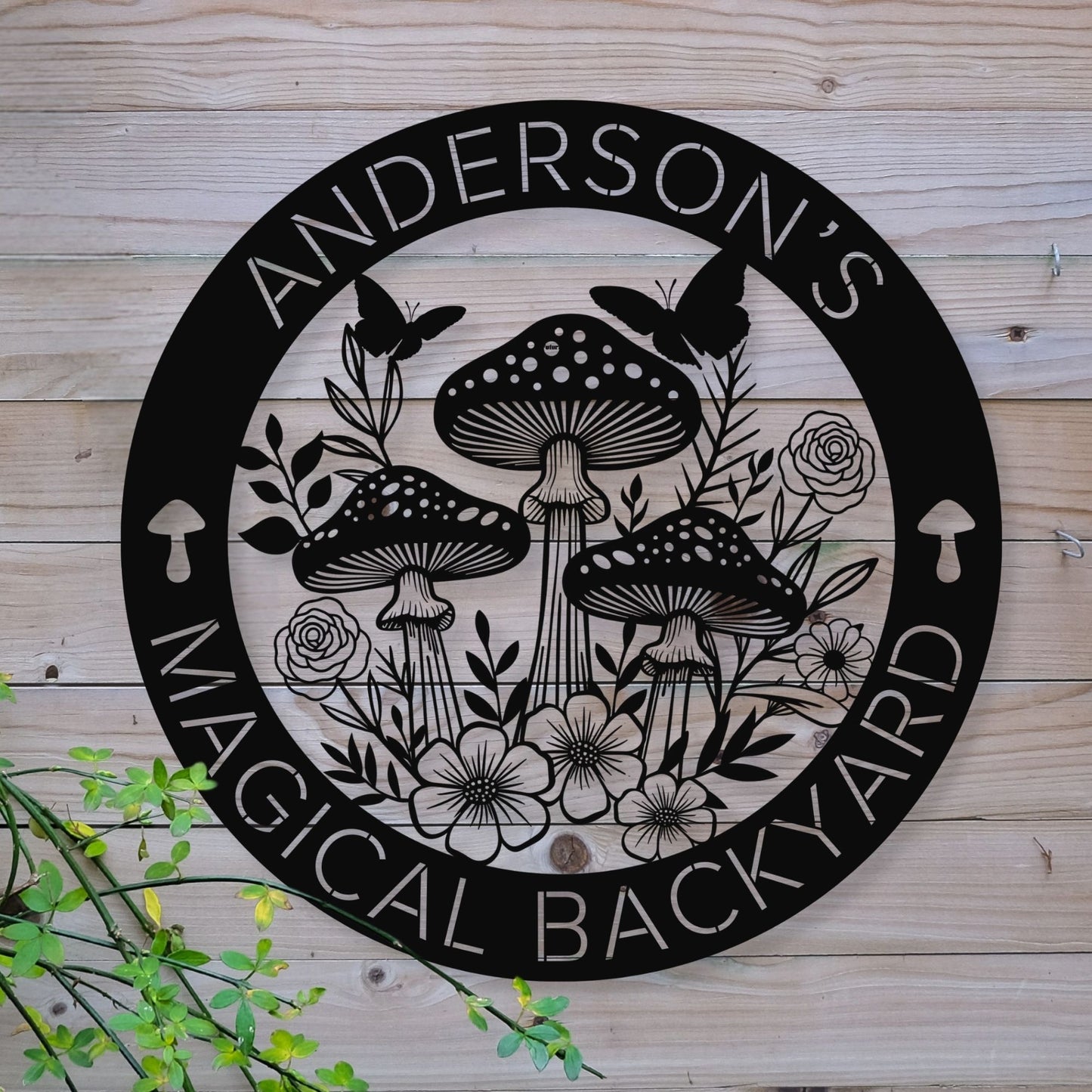 Decorative sign with mushrooms and flowers on a wooden background