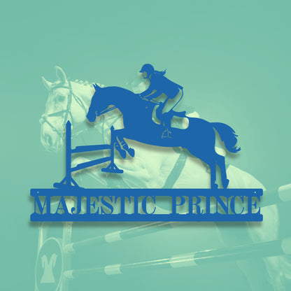 Decorative metal sign with horse and rider design and 'Majestic Prince' text on a teal background.