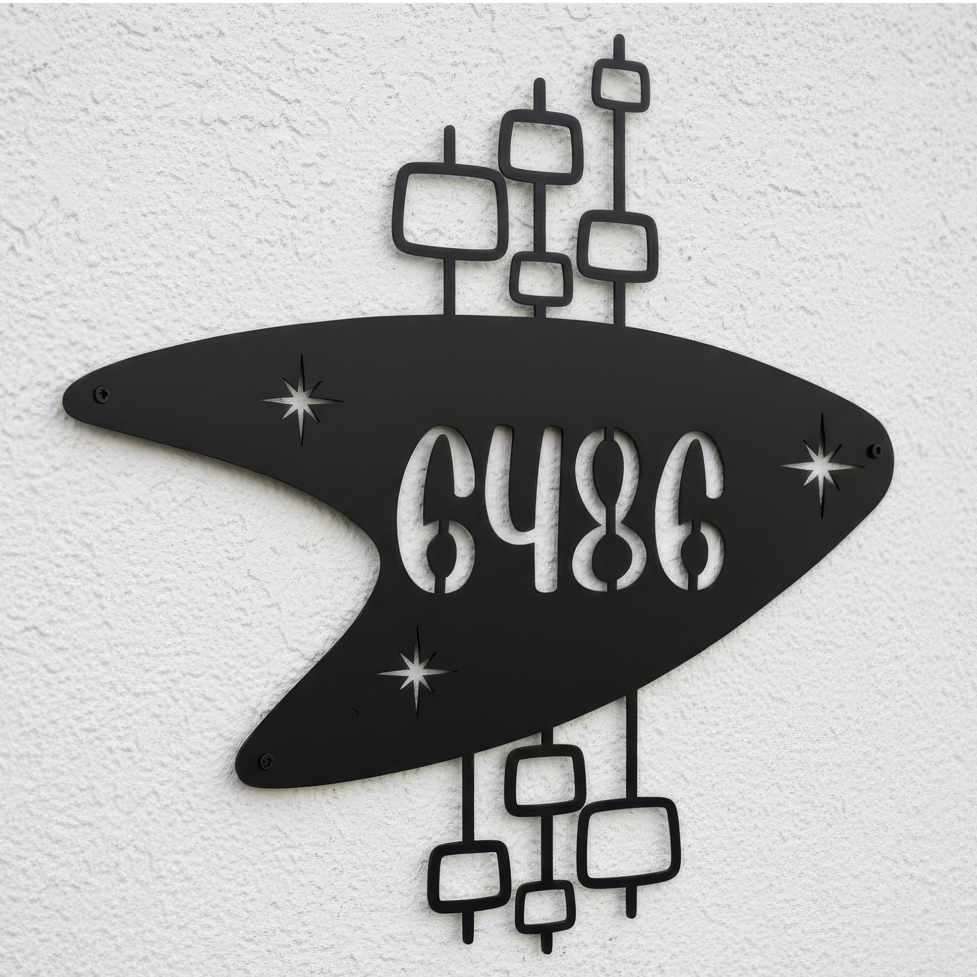 Decorative metal wall art with abstract shapes and numbers '6486' on a textured white background