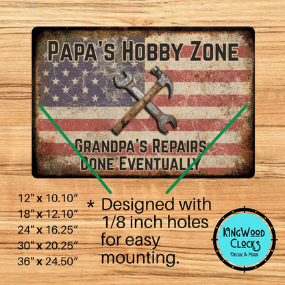 Decorative sign with American flag design and tools, featuring text about 'Papa's Hobby Zone' and 'Kingwood Clocks'.