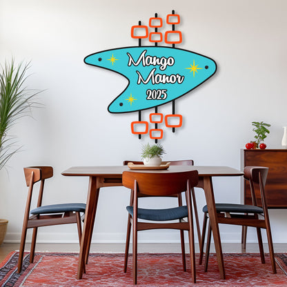 Personalized Retro Metal Sign hung over dining room table with Mango Manor and 2025 printed on it